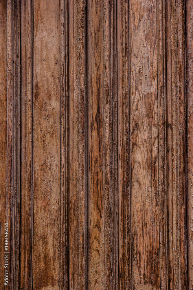Brown wooden texture. Old planks with peeling paint. Brown wooden texture. Old planks with peeling paint.