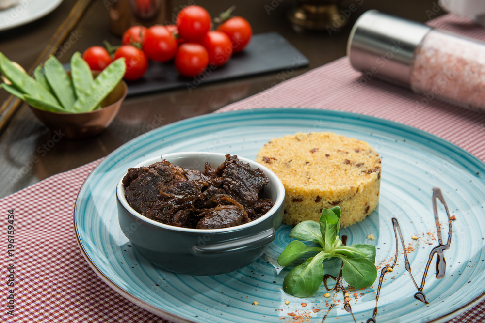 Gourmet food, garnished cuscus and grilled meat