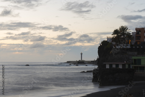 Sunset at the beach of Puerto Naos with lighthouse at the background at La Palma / Canary Islands © Bild in motion