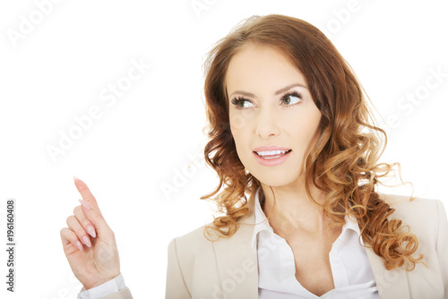 Wallpaper Mural Businesswoman pointing up. Torontodigital.ca