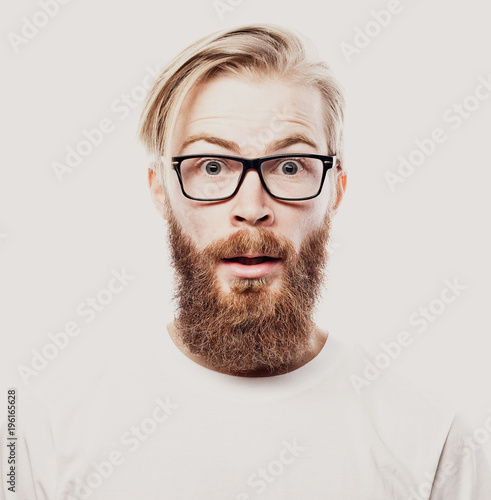 Bearded hipster young man wearing glasses  isolated on white background