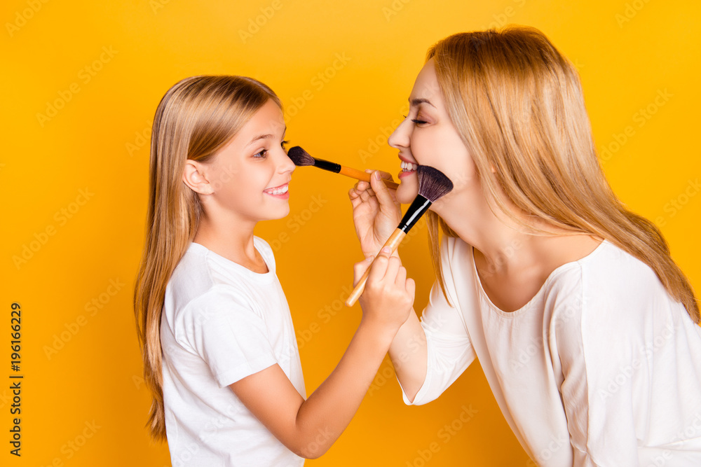 Two people relatives joy having fun enjoy dermatology spend time artist hairstyle concept. Profile side view photo of cute lovely beautiful charming nice friendly mom mum mommy kid doing makeup Two people relatives joy having fun enjoy dermatology spend time artist hairstyle concept. Profile side view photo of cute lovely beautiful charming nice friendly mom mum mommy kid doing makeup