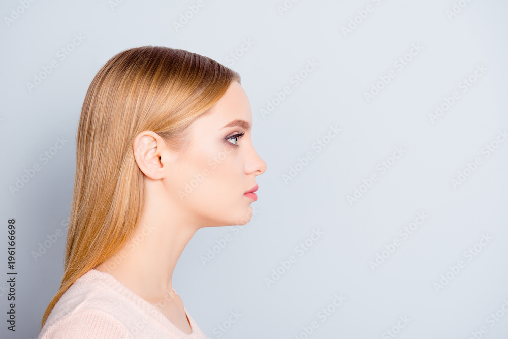 Half-faced profile side view close up portrait of serious confident focused concentrated thinking pondering pretty cute lovely manager wearing beige blouse isolated on gray background copyspace
