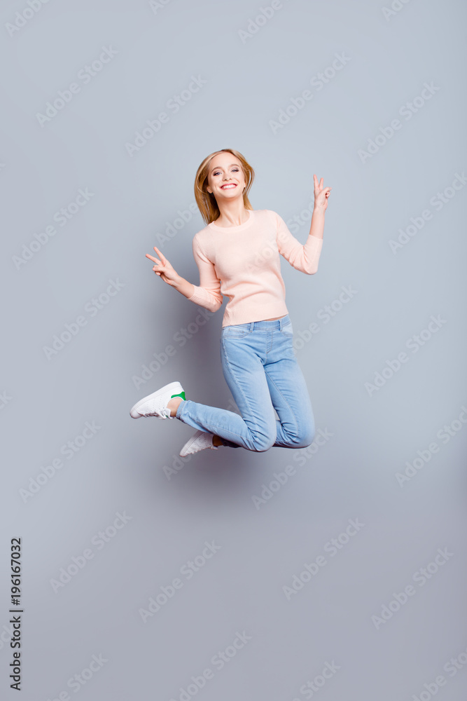 Sweater denim freedom freelancer win winner fun joy enjoy luck fortune come true weekend concept. Full-length vertical of cheerful careless joyful cute manager jumping up isolated on gray background