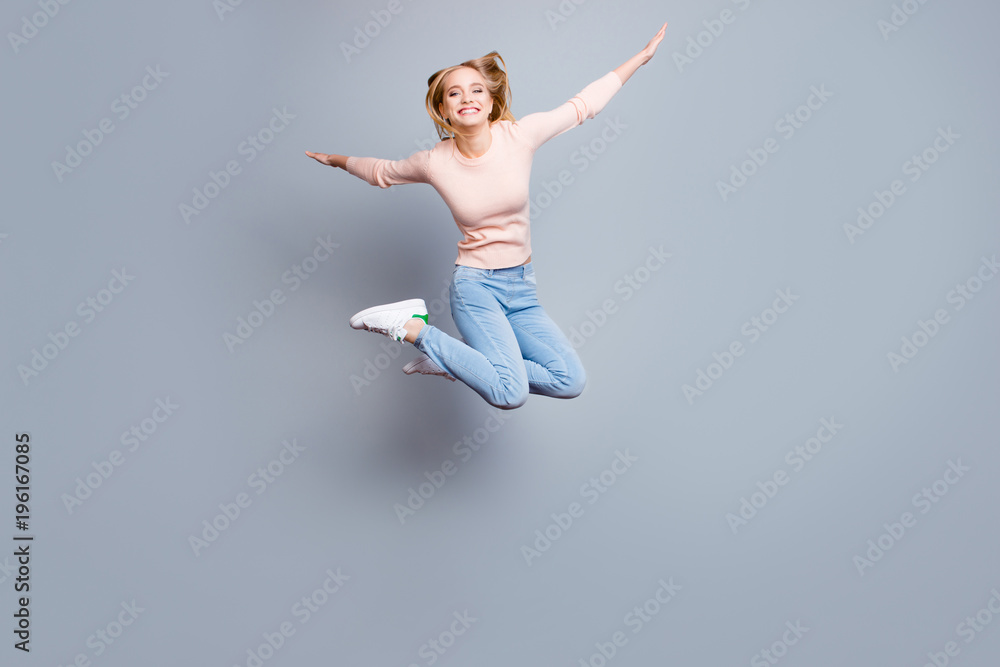 Joy fun enjoy funny crazy mad funky chill positive lifestyle person concept. Full-size view of excited cheerful delight rejoicing pretty employee jumping up isolated on gray background