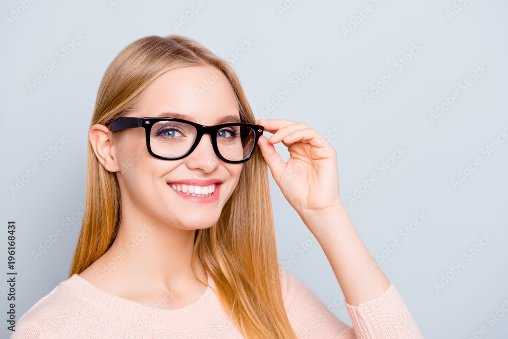 Half-turned portrait of confident smart clever intelligent experienced beautiful with toothy beaming smile freelancer entrepreneur correcting fixing glasses isolated on gray background copy-space Half-turned portrait of confident smart clever intelligent experienced beautiful with toothy beaming smile freelancer entrepreneur correcting fixing glasses isolated on gray background copy-space