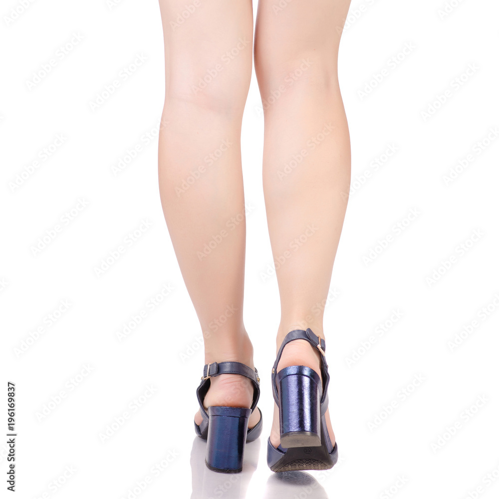 Female legs in blue leather shoes sandals beauty fashion buy shop Female legs in blue leather shoes sandals beauty fashion buy shop