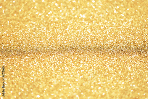 Gold and glitter background with narrow focus. Gold Dust