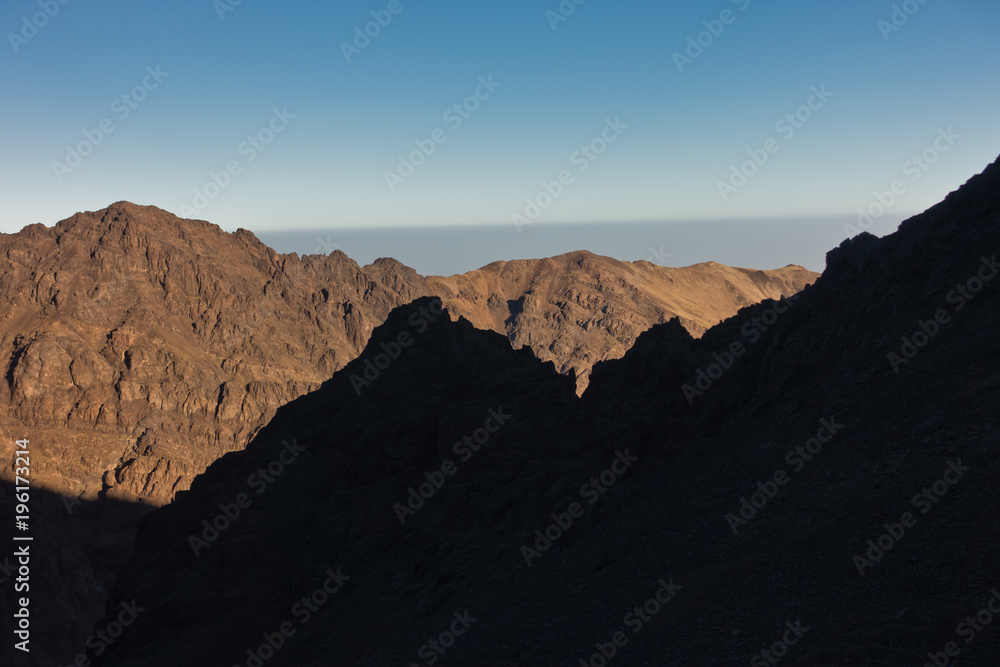 Mountain peaks of High Atlas mountains at surise in Toubkal national park, Morocco, North Africa