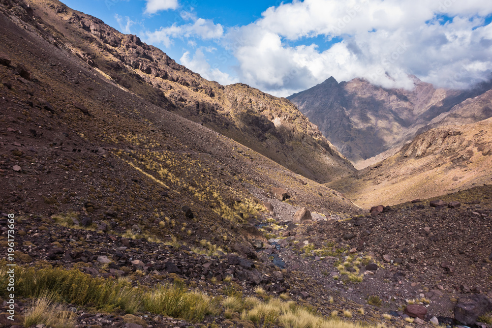 Toubkal national park trek through values and peaks of High Atlas mountains in Morocco, North Africa