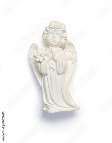 Small plaster angel. Symbol of Easter isolated clipping mask on white background with path, top view