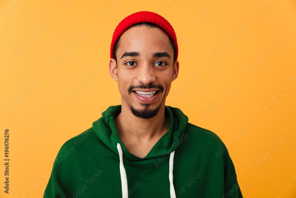 Fototapeta premium Portrait of a smiling young afro american man