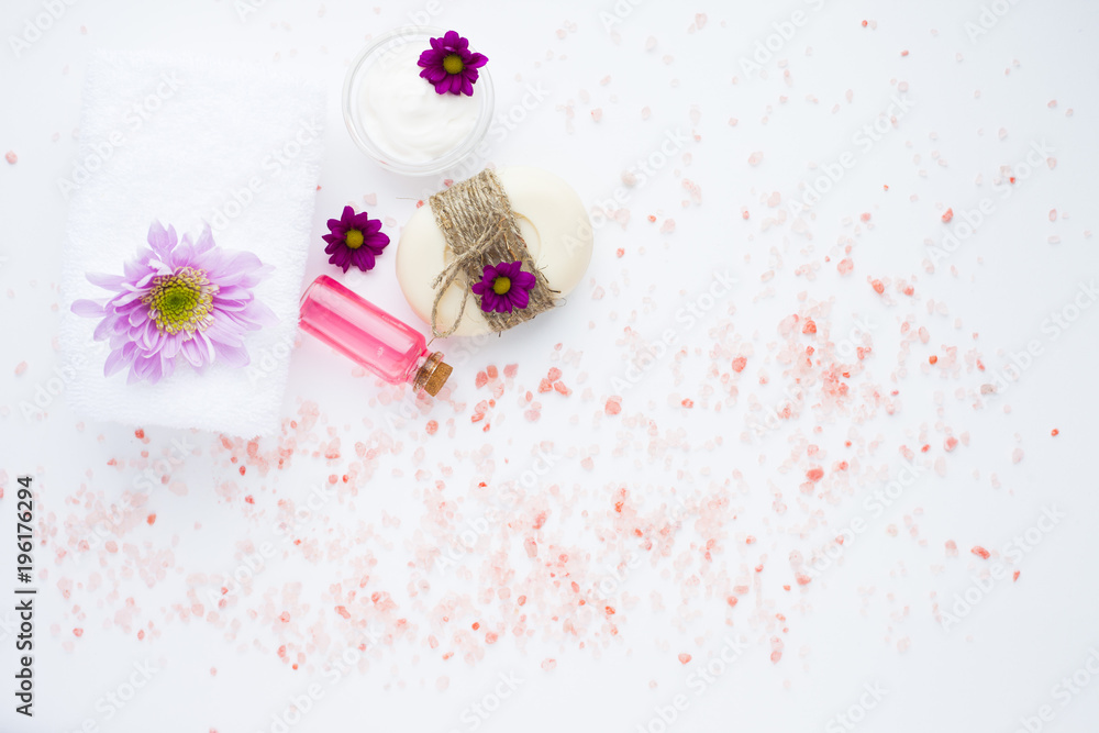 Spa and natural cosmetic concept. Composition of spa treatment for beauty and skincare on the white background. Top view. Close up. Spa and natural cosmetic concept. Composition of spa treatment for beauty and skincare on the white background. Top view. Close up.