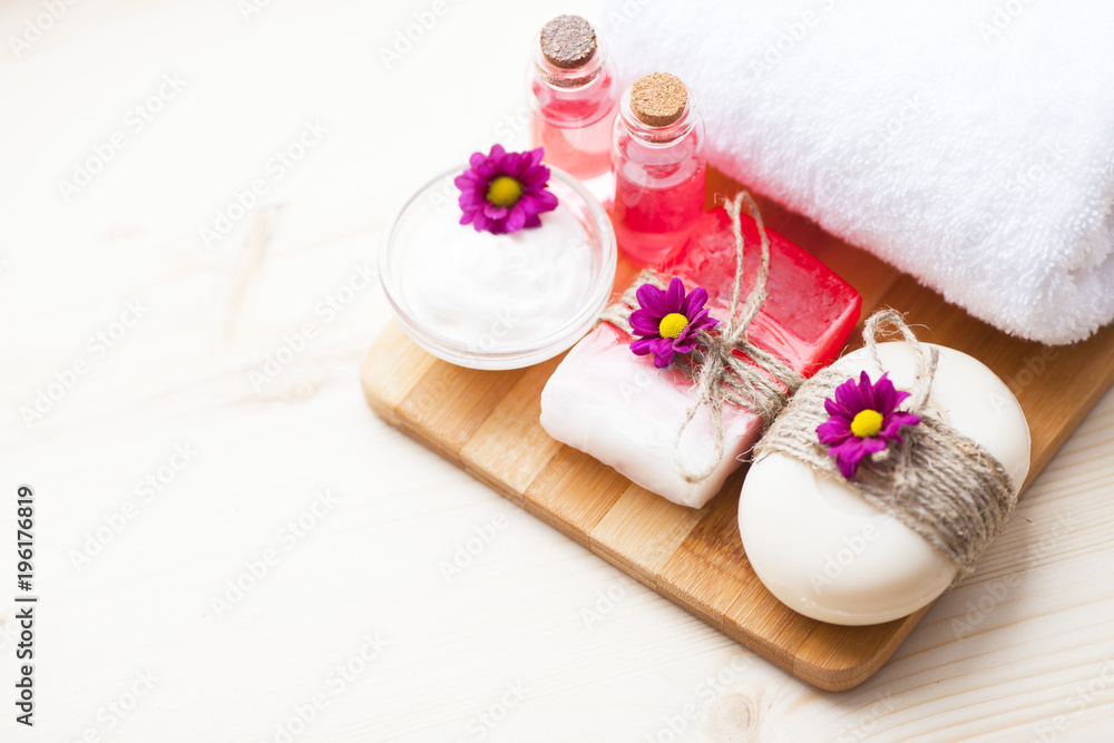 Spa and natural cosmetic concept. Composition of spa treatment for beauty and skincare on the wooden background. Top view. Close up. Spa and natural cosmetic concept. Composition of spa treatment for beauty and skincare on the wooden background. Top view. Close up.