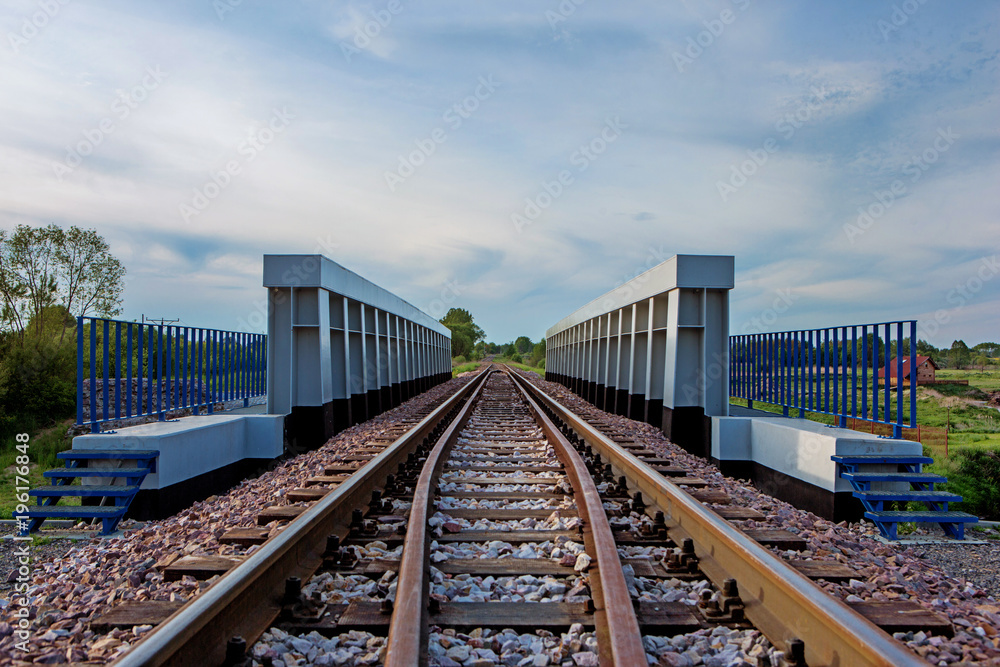 Fototapeta premium Railroad in sunset, railway