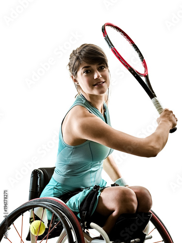 one caucasian young handicapped tennis player woman in welchair sport tudio in silhouette isolated on white background