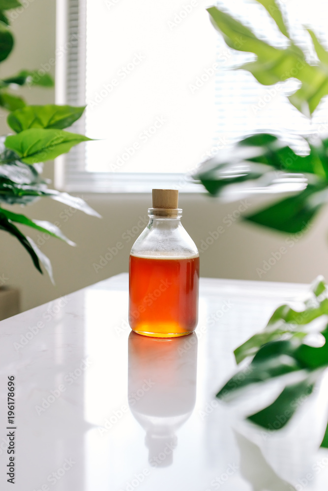 Glass can full of honey on table. Glass can full of honey on table.