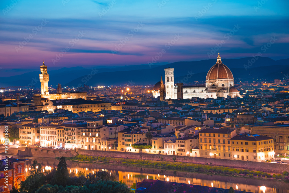 A fabulous panoramic view of Florence from Michelangelo Square in the evening lights. It is a pilgrimage of tourists and romantics. Duomo Cathedral. Italy, Tuscany