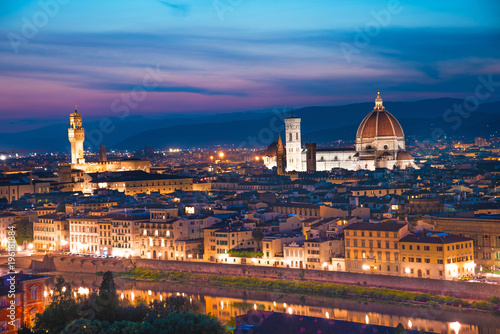 A fabulous panoramic view of Florence from Michelangelo Square in the evening lights. It is a pilgrimage of tourists and romantics. Duomo Cathedral. Italy, Tuscany