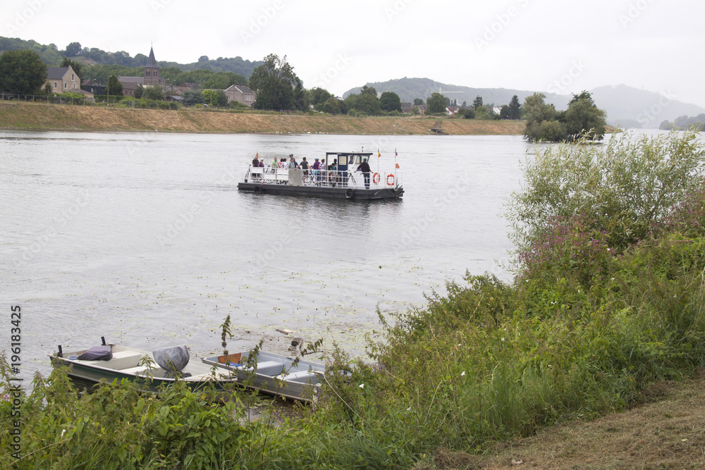 Pedestrian ferry over river Meuse