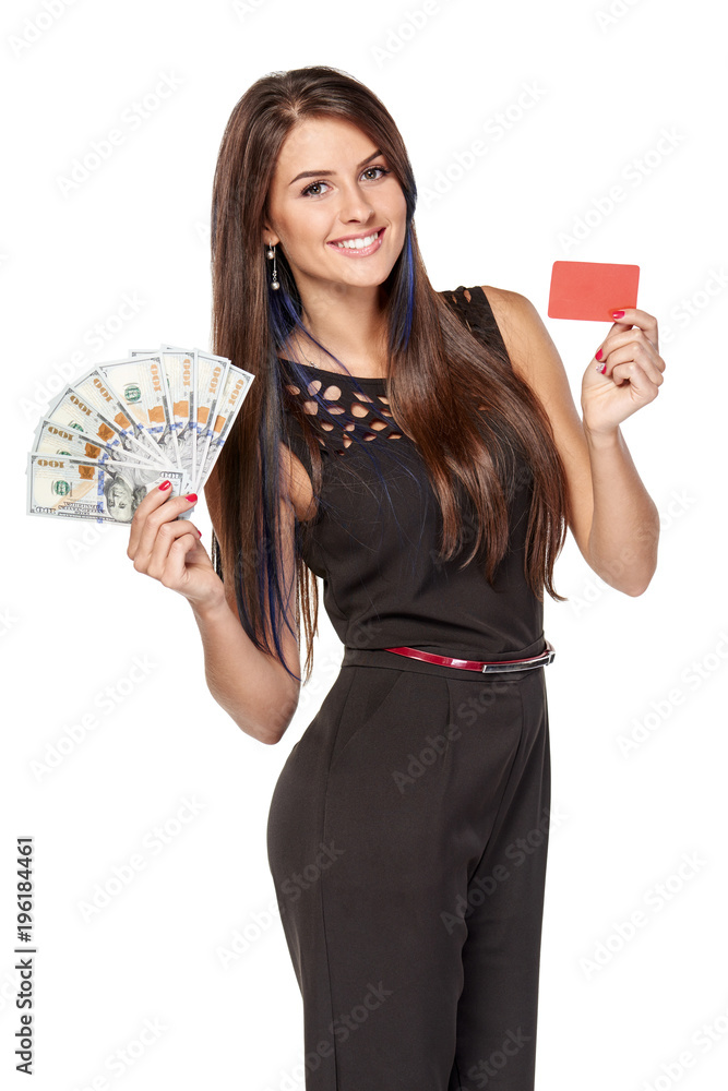 Credit card or cash. Smiling woman showing blank credit card and holding cash US dollars, over white background Credit card or cash. Smiling woman showing blank credit card and holding cash US dollars, over white background