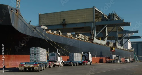 Trucks lining up to export aluminum from Australian port - 4K 