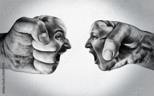Two fists with a male and female face collide with each other on light background. Concept of confrontation, competition, family quarrel etc. Black and white. photo