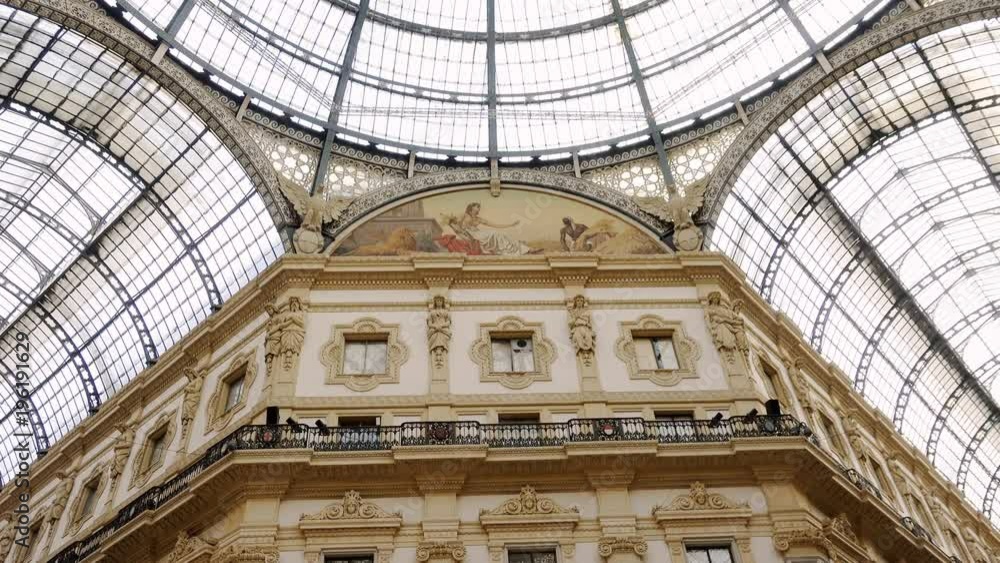 suggestive view of Christmas time in Vittorio Emanuele II Gallery in Milan,Italy suggestive view of Christmas time in Vittorio Emanuele II Gallery in Milan,Italy