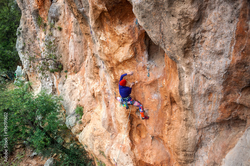 A rock climber on a rock.