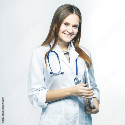  portrait - a family doctor with stethoscope on white background