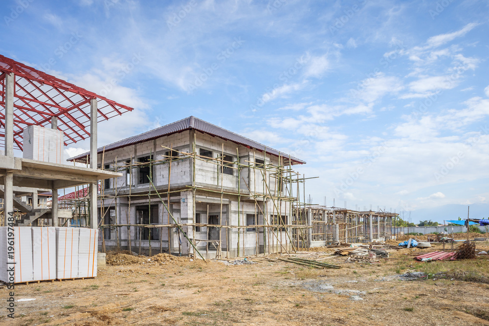 construction residential new house in progress at building site