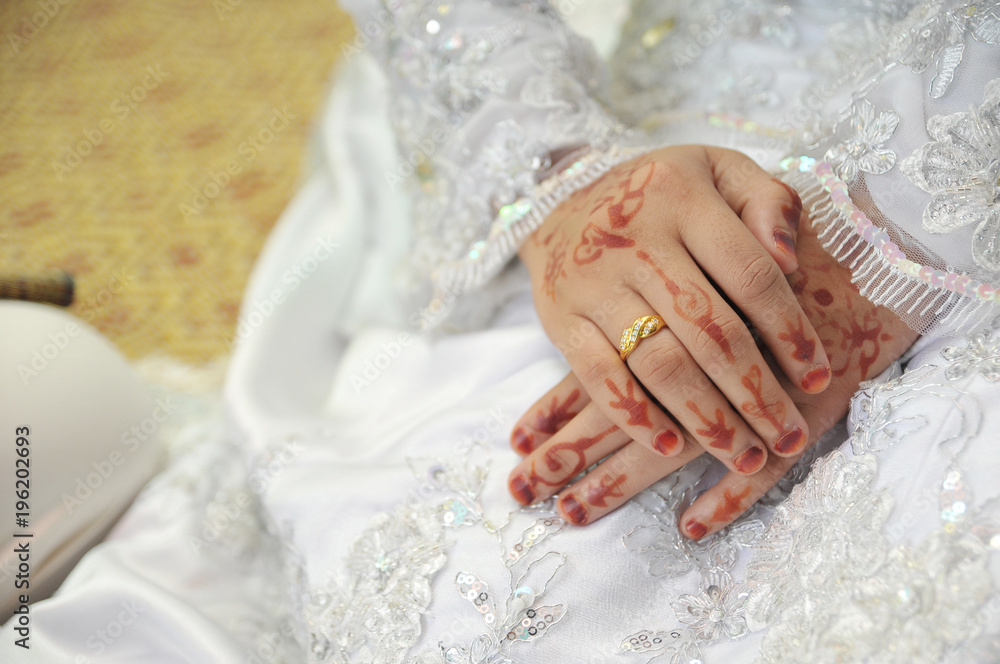 Symbol of loves - bride hands with henna design and ring Symbol of loves - bride hands with henna design and ring