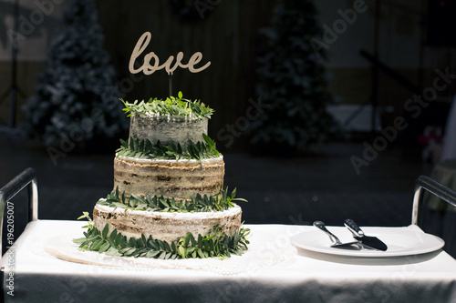 Wedding cake decorated with leaves