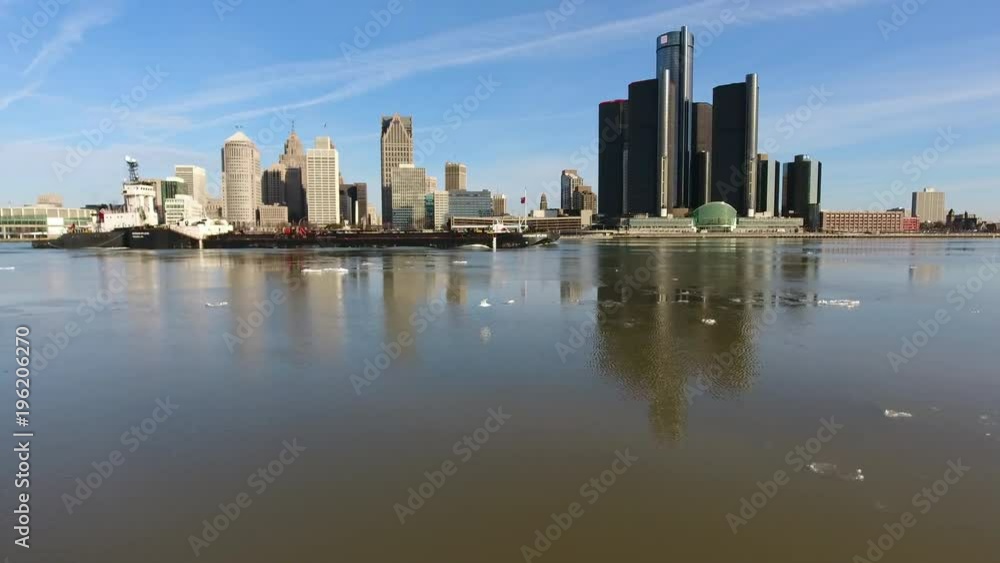 Over Icy River and Barge Towards Downtown Detroit Skyline Over Icy River and Barge Towards Downtown Detroit Skyline