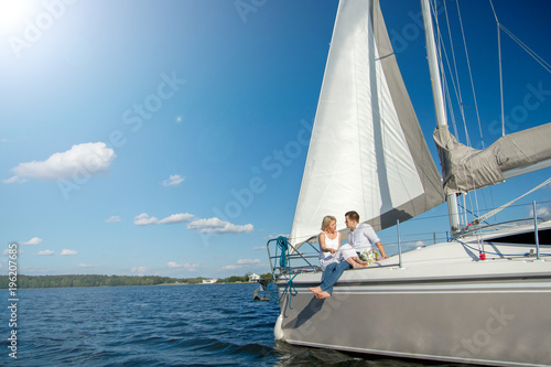 couple in love on a yacht in the summer.
