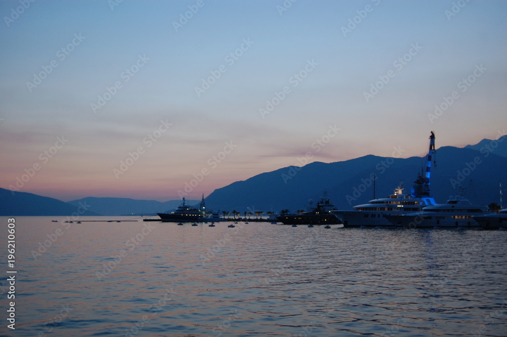 Yachts in the port of Montenegro in the evening light.