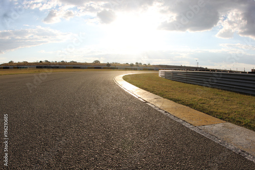 Slika na platnu Race track corner at sunset