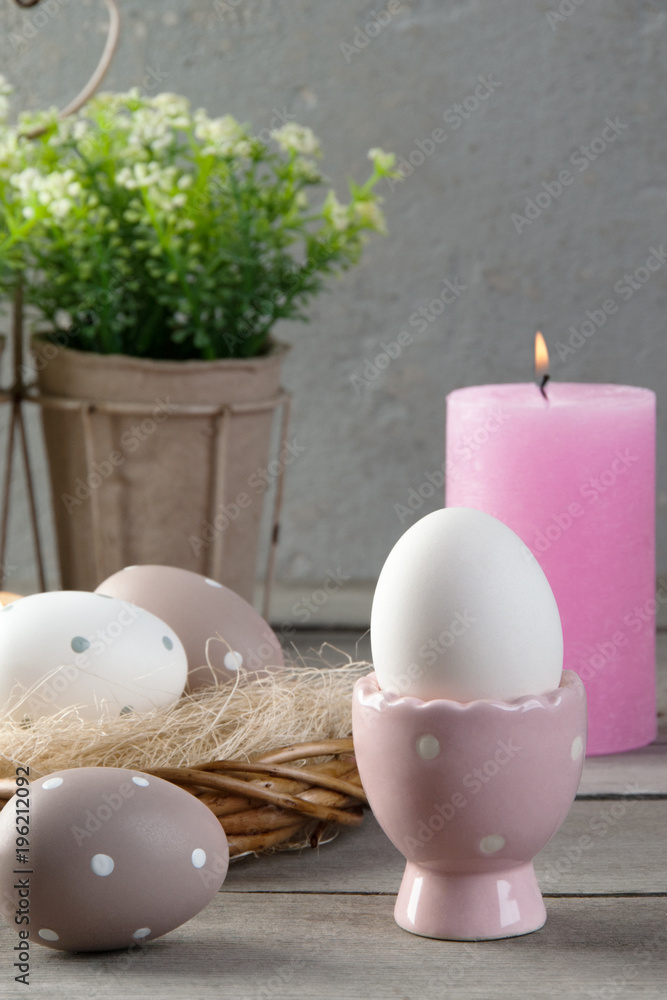 Fototapeta Eggs and rose aroma candle on old wooden background
