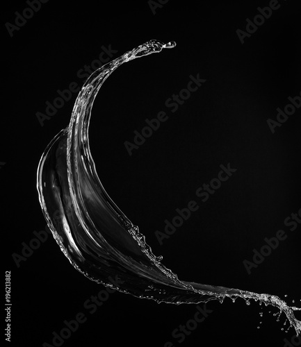 Clear, transparent water splash on black background 