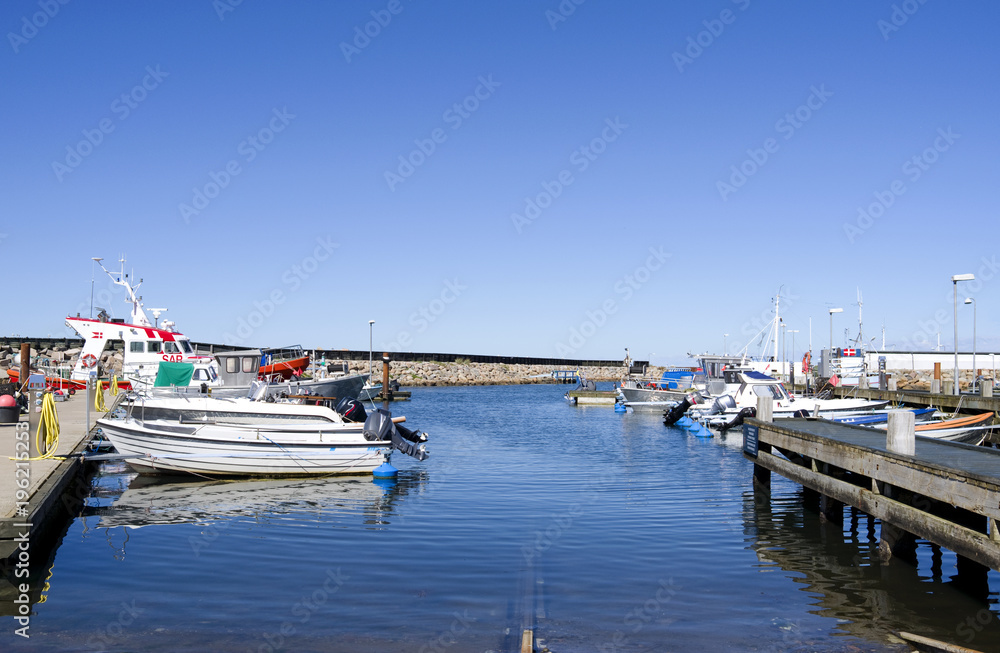 Laesoe / Denmark: SAR lifeboat at the head of a pier in the basin for small fishing boats in Oesterby Havn Laesoe / Denmark: SAR lifeboat at the head of a pier in the basin for small fishing boats in Oesterby Havn