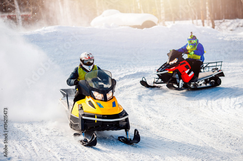 Snowmobile. Snowmobile races in the snow. Concept winter sports, racers.