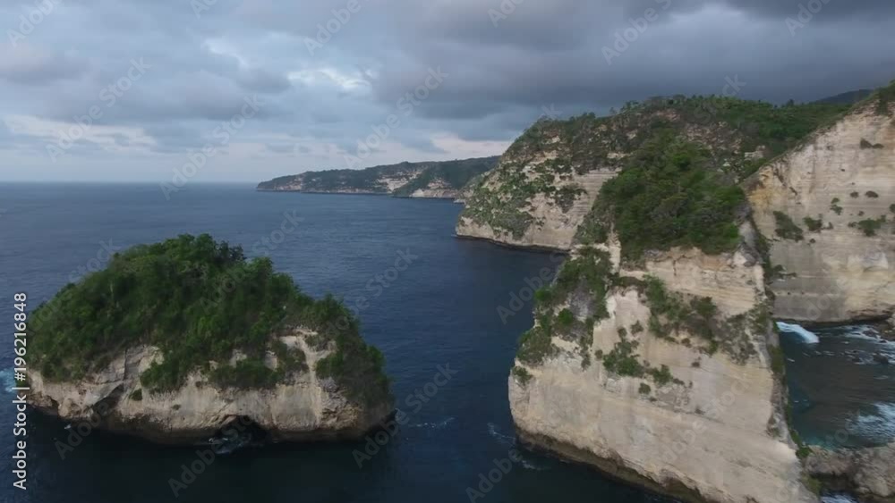 Flying Between Sea Cliffs in Bali Indonesia Flying Between Sea Cliffs in Bali Indonesia