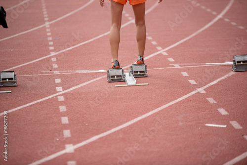 Athletics people running on red running track © sunyawitphoto