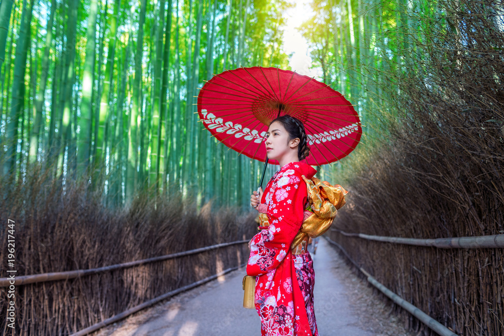 Bamboo Forest. Asian woman wearing japanese traditional kimono at Bamboo  Forest in Kyoto, Japan. Stock Photo | Adobe Stock