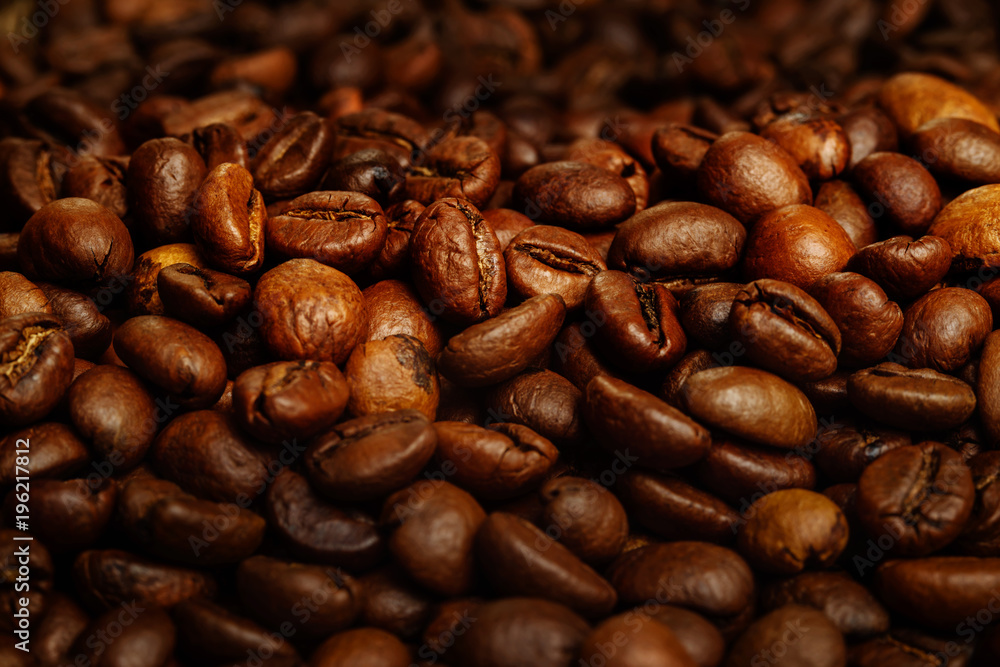 Fototapeta premium Coffee beans close-up. Beautiful saturated color