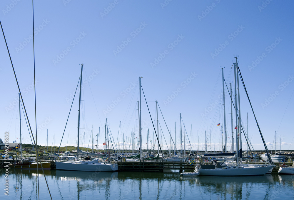 Laesoe / Denmark: Sail masts dominate the scape of Oesterby Havn’s popular marina on the north-west coast of the island