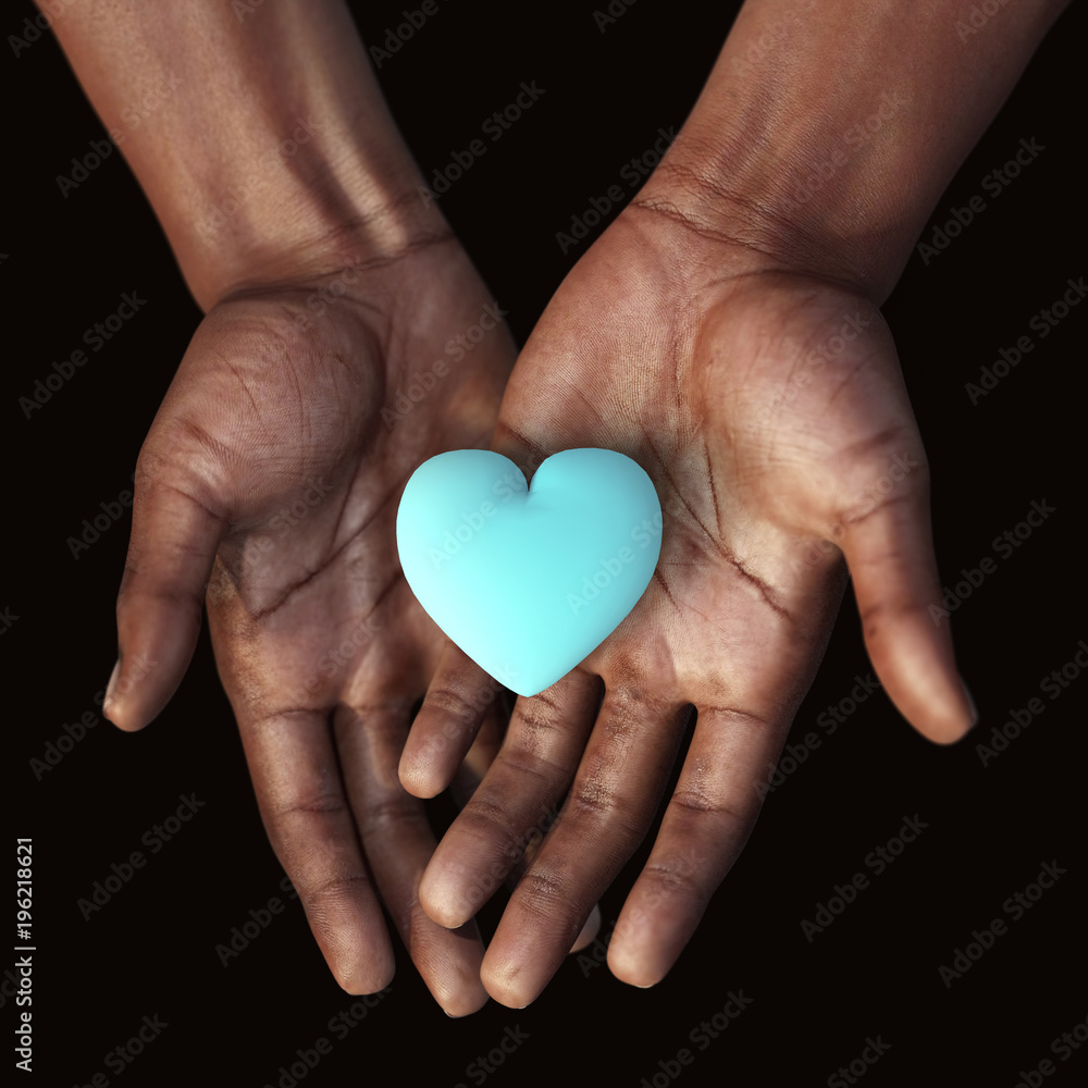 Fototapeta premium African hands holding a blue heart