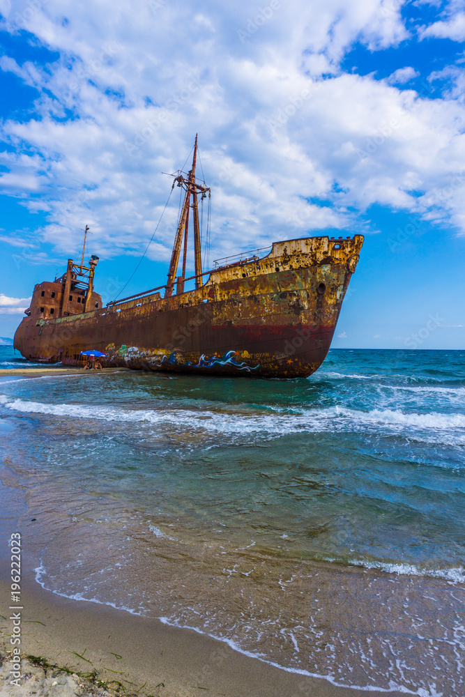 The famous, old and rusty shipwreck Agios Dimitrios in Gythio of Peloponnese in Greece The famous, old and rusty shipwreck Agios Dimitrios in Gythio of Peloponnese in Greece