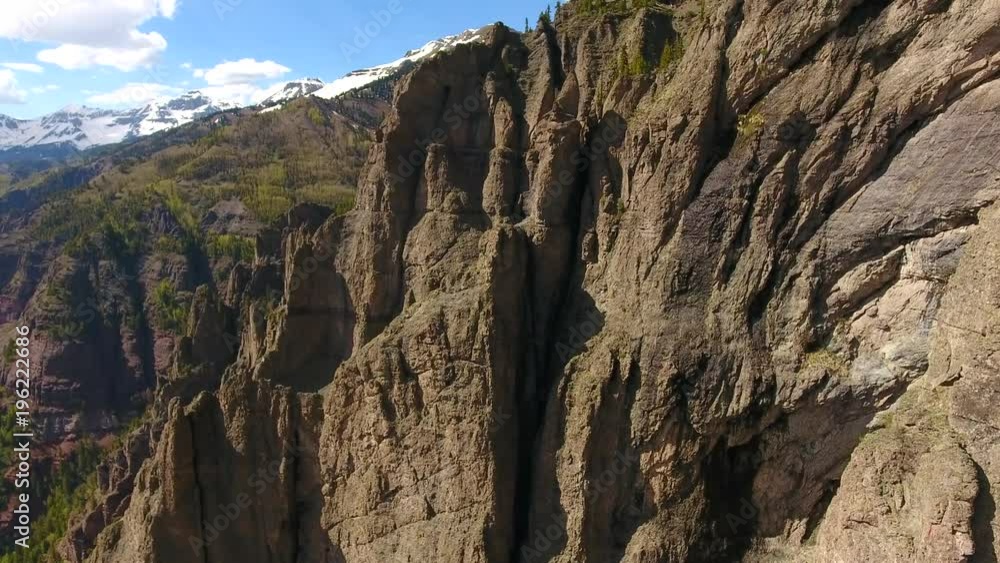 Soaring Past Huge Colorado Cliffs Towards Mountains Soaring Past Huge Colorado Cliffs Towards Mountains