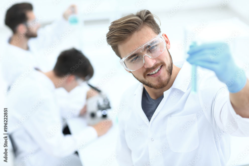 closeup. scientist with beaker closeup. scientist with beaker